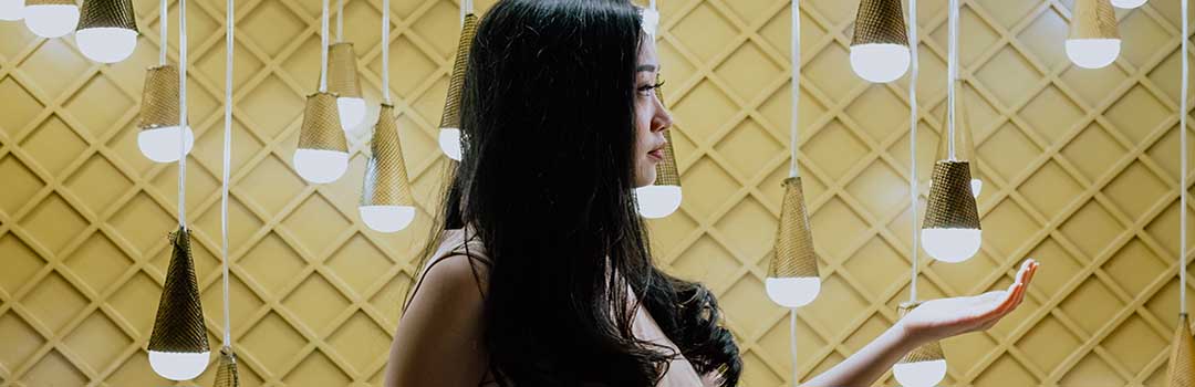 Lady in hanging lights